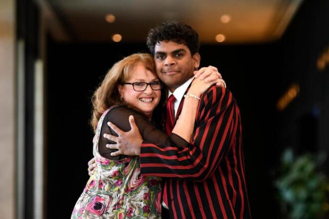 Young cancer survivor reuniting with his nurse leads inspiring stories at Beneficiary breakfast
